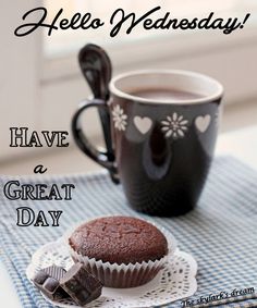 a cup of coffee next to a muffin on a doily with the words hello wednesday have a great day