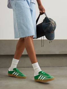 adidas Originals' 'Gazelle Indoor' sneakers were initially released in the '70s as an indoor sports shoe and have since grown to become an iconic streetwear staple. This iteration is made from green nylon with suede and leather trims and gummed rubber soles. Cinch Bag, Adidas Shoes Originals, Adidas Originals Women, Green Sneakers, Green Shoes, Sneakers Outfit, Ski Wear, Clothes Collection, Women Collection