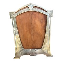 an old wooden and metal frame on a white background