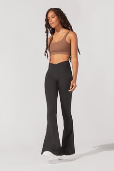 Our Y2K-inspired flared legging just got even more dramatic. With their just-below-the-knee flare, these leg-lengthening bell bottoms add a retro-inspired touch to any outfit. Compression Level: Performance Level: Popflex Outfits, Theater Camp, Bell Bottom Leggings, Perfect Leggings, Buy Leggings, Flared Leggings, Leggings Hoodie, Workout Fits, Short Torso