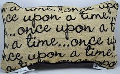 a decorative pillow with writing on it