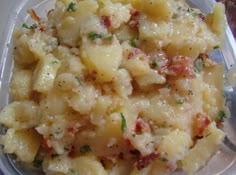 a plastic container filled with macaroni and cheese