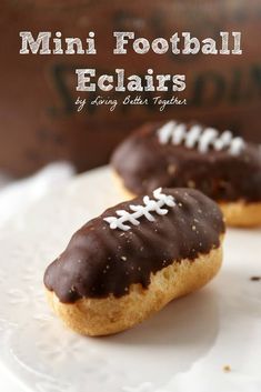 mini football eclairs on a plate with chocolate frosting