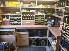 a room filled with lots of tools and cabinets