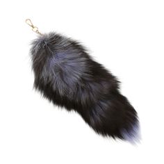 an animal fur keychain is shown on a white background