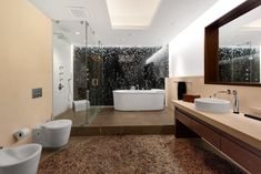 a bathroom with two sinks and a bathtub