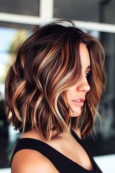 As we venture into 2024, hair color trends are embracing individuality and boldness, offering a palette Balayage For Short Brown Hair, Short Dark Brown Hair With Copper Highlights, Blonde Ends On Brown Hair Short, Dark Auburn Hair With Blonde Money Piece, Hair Highlights For Dark Short Hair, Apricot Highlights In Brown Hair, Two Tone Highlights For Brown Hair, Golden Highlights Brown Hair Short, Brown Highlighted Hair Ideas