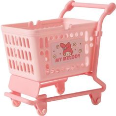 a pink toy shopping cart with hello kitty on it's side and the words, my melody