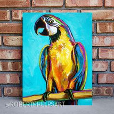 a painting of a colorful parrot perched on a branch in front of a brick wall