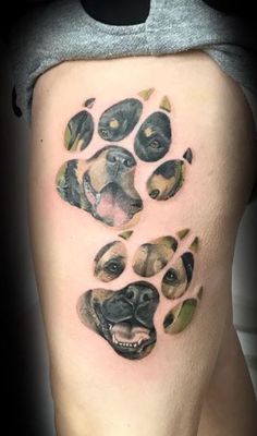 a dog paw tattoo on the right thigh