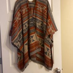 Beautiful Women’s Shaw/Poncho. Button Closure And Button Closure On Sides. Tan, Gray, Burnt Orange Colors. New Without Tags. Very Soft. Plaid Capes, Knit Poncho Sweater, Black Poncho, Mustard Sweater, Aztec Style, Poncho Cardigan, Aztec Fashion, Wool Poncho, Boho Sweater