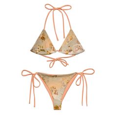 Stay comfortable and stylish all summer with this All-Over Print Recycled String Bikini set. It's made from soft recycled polyester with double-layering and UPF 50+. Style the straps how you like, and get ready to swim!  * Soft and stretchy material with UPF 50+ * Sizes up to XL * Bikini top comes with removable padding for comfort * Multiple ways to tie and style the bikini set * Color design options for swimwear lining * Blank product components in the EU sourced from Spain, Vietnam, Cambodia, Cotton Swimwear For Sunbathing In Spring, Cotton Summer Swimwear For Sunbathing, Cotton Tie-side Swimwear For Beach, Fitted Tie-side Bottom Swimwear For Spring, Fitted Tie-side Swimwear For Spring, Spring Fitted Tie-side Swimwear, Beachy Cotton Swimwear With Triangle Top, Beachy Swimwear With Triangle Top, Cotton Fitted Swimwear For Beach