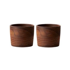 two wooden cups sitting next to each other