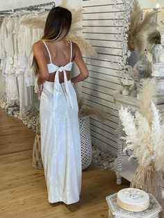 Maxi Length Tie Back Dress For Night Out, Long Tie-back Dress For Date Night, Long Tie Back Dress For Date Night, Chic White Backless Dress For Party, Long Dress With Tie Back For Date Night, White Tie Back Backless Dress, Glamorous Tie Back Maxi Dress For Night Out, Glamorous Maxi Dress With Tie Back For Night Out, Backless Sequin Maxi Dress For Summer