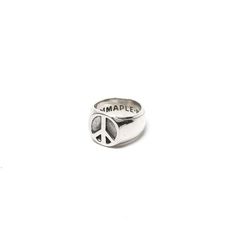 Details:    -the peace ring has a classic round signet silhouette featuring a peace sign. the tinted recessed area of the symbol give the it depth while the rest of the 925 silver ring shines.    - 925 silver  - hand carved detailing  - maple logo inside  - made in bali    sizing:    - us-7 (17mm)    - us-8 (18mm)    - us-9/ (18.6mm) Maple Logo, Peace Ring, Frye Harness Boots, Sea Ny, Lug Sole Boots, Harness Boots, A Perfect Circle, 925 Silver Ring, Peace Sign