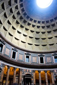 the interior of an ancient building with columns