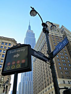 the street sign is clearly visible for everyone to see on this city's streets