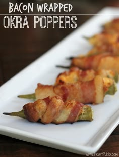 bacon wrapped okra peppers on a white plate