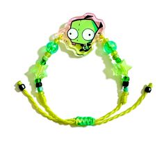 please carefully choose which bracelet you are purchasing, they are all slightly different! a handmade bracelet, GIR from invader zim themed. lovingly crafted by Peruvian artists. the model wrist shown is 6 inches each bracelet has plenty of string and is adjustable. (up to 8 inches) *These bracellets are a collaboration with etsy shop: MaracuyasArt ⬥ Colors may vary between your monitor's colors and the physical product. ⬥ Customs and import taxes: Buyers are responsible for any customs and import taxes that may apply. I'm not responsible for delays due to customs. Adjustable Themed Jewelry For Cosplay, Customized Themed Bracelets As Gift, Customized Themed Bracelets For Gifts, Hand Painted Green Bracelet As Gift, Handmade Themed Charm Bracelet For Friendship, Adjustable Rave Wristband Gift, Handmade Green Novelty Beaded Bracelets, Handmade Themed Wristband, Handmade Themed Wristband For Gift