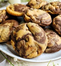 a plate filled with chocolate cookies on top of a table