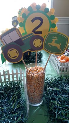 a table topped with lots of food and decorations