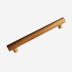 a wooden handle on a white background