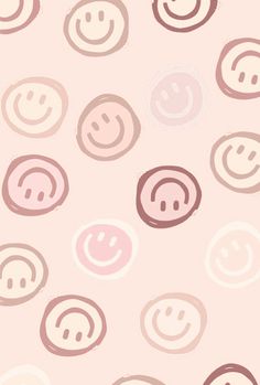 a pink background with smiley faces on it