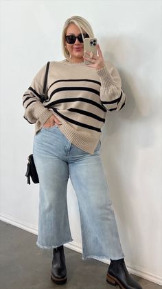 Casual chic winter ootd - wide leg denim jeans with a striped sweater and black boots. Save this look for all of your casual christmas and holiday parties, or casual date night this winter season! Crew Sweater Outfit Women, Fall 2024 Outfits Plus Size, Neutral Outfits Plus Size, Fall Outfits Thicker Women, Midsize Mom Fashion, Uk Outfit Women, Mum Outfits Mom Style, Casual Winter Outfits Plus Size, Fall Winter Outfits Plus Size