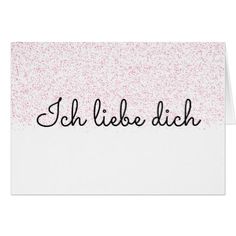 the words i love you in black ink on a white background with pink speckles