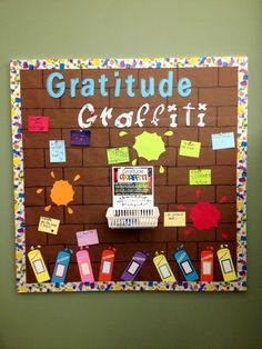 a bulletin board with post it notes and pictures on it that says gratitue graffiti