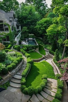 an outdoor garden with stone steps and green grass in the foreground, surrounded by trees