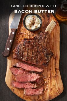 grilled ribeye with bacon butter on a cutting board