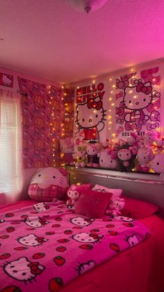 a bedroom with hello kitty bedding and lights