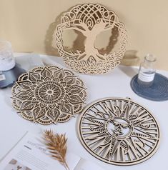 PRICES MAY VARY. Laser Cut and made with 1/4” Birch Plywood, 11.8” inches in diameter, no paint wood color. 3 pieces of sacred geometry wall hanging arts in 3 designs including Sun, Life Tree, and Flower of Life, high quantity and rich styles can easily meet your decorative requirement The sacred geometry antique wooden art adds a high spiritual touch to your hallway, garden, kitchen, bathroom, living room, bedroom, dining room, and any place where you desire a serene ambiance. Additionally, it Zen Room Decor, Mandala Meditation, Front Elevation Designs, Acrylic Designs, Wooden Wall Decor, Spiritual Gifts, Crystal Grid, Wooden Art, Flower Of Life