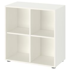 a white bookcase with three shelves on each side