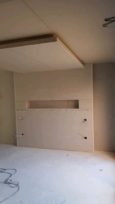 an empty room with unfinished walls and no one in the room to be used for storage