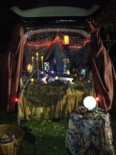 the back of a van decorated with lights and decorations