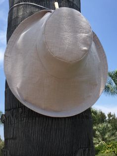 Natural Linen Sun Hat Wedding Hat Wide Brimmed Sun Hat Elegant Sunhat Large Brim by Freckles Califor Classic Linen Hat With Curved Brim, Beige Linen Hat With Short Brim, Elegant Curved Brim Hat, Classic Solid Color Sun Hat With Curved Brim, Adjustable Linen Flat Brim Hat, Adjustable Linen Hat With Flat Brim, Elegant Solid Panama Hat With Wide Brim, Cream Wide Brim Straw Hat, Classic Beige Cloche Hat With Flat Brim