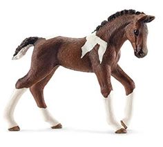 a toy horse is shown on a white background