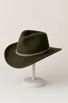 Worn on a rugged mountain pass or for a destination city dinner out, the Crossroads outback hat accompanies you in timeless, ready-for-adventure style. Crafted from soft and durable Australian wool felt, this crushable hat is as easy to pack as it is effortless to wear. A genuine leather whipstitched hat band adorns the base of the pinched crown, while a cushioned sweatband wicks away moisture for all-day comfort. Outback Hat, Mountain Pass, Hats Women, The Crossroads, Adventure Style, Western Hats, Best Western, Hat Band, Wicks