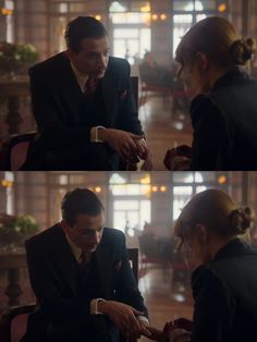 two pictures of a man in a suit and tie looking at something on his hand