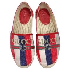 Step into style with the Gucci Sylvie Logo Espadrilles—an iconic pair that effortlessly combines classic design with a vibrant pop of color. These espadrilles aren't just shoes; they are a statement of comfort, fashion, and the unmistakable flair of Gucci. Picture yourself in these classic espadrilles featuring red, white, and blue stripes, adorned with a large Gucci logo in the center. The boat-style design adds a touch of casual sophistication, making these shoes a versatile addition to your w Gucci Espadrille, Gucci Espadrilles, Boat Style, Gucci Sylvie, Blue Espadrilles, Hermes Wallet, Boat Fashion, Comfort Fashion, Gucci Logo