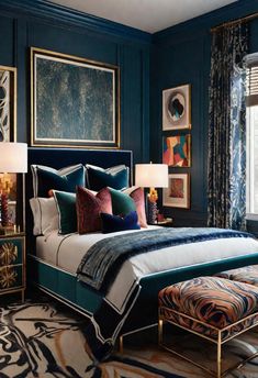 a bedroom with blue walls and gold accents