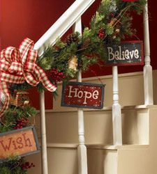 christmas decorations on the banisters and stairs