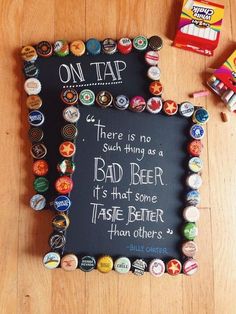 a blackboard with beer caps on it and the words holiday treats written on it