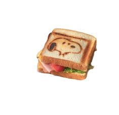 a toasted sandwich with a face drawn on it