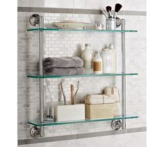 an image of a bathroom shelf with glass shelves