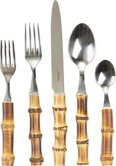 an assortment of silverware including forks, knives and spoons