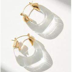 New~ Anthropologie Clear Resin Hoop Earrings Count On These Resin Hoops To Add A Dash Of Au Courant Flair To Everyday Ensembles. Gold Plated Metal, Resin. Approx. Size: 1-3/8"L, 1-1/4"W. Nwot. Anthro Style, Boho Style, Trendy, Brand New Anthropologie Jewelry, Everyday Hoop Earrings, Gold Hoops, Clear Glass Resin Hoops, See Through, Modern Loop Resin Earrings, Modern Clear Hoop Earrings For Pierced Ears, Modern Clear Hoop Earrings, Modern Small Hoop Clear Earrings, Modern Small Hoop Clear Jewelry, Trendy Clear Hoop Earrings For Parties, Modern Small Hoop Jewelry In Clear, Modern Clear Small Hoop Jewelry, Trendy Clear Metal Jewelry