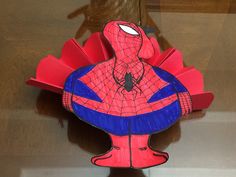 a paper turkey shaped like a spider man